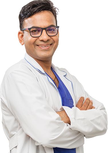 Dr. Tarak Patel, Best Spine Surgeon in Ahmedabad in White Hospital Dress.